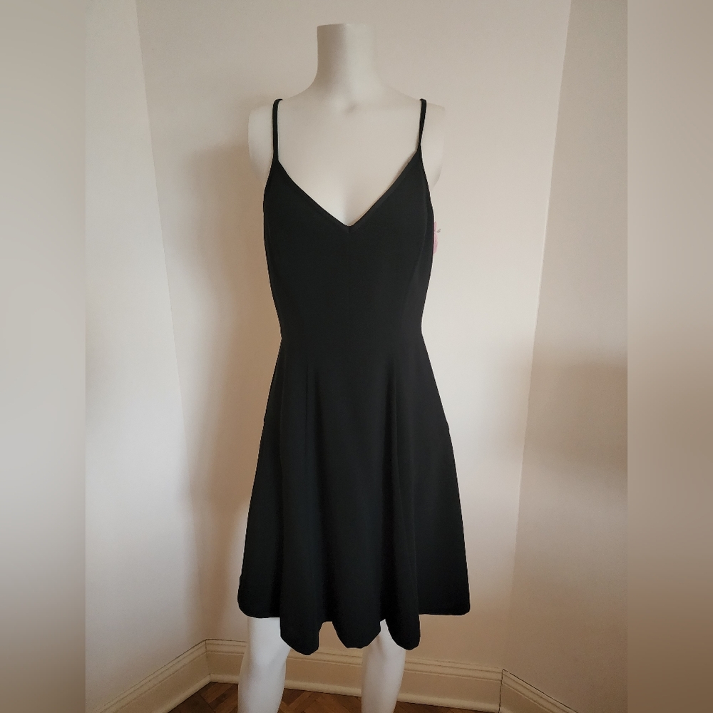 Lightly worn Trina Turk Sleeveless cut out black dress